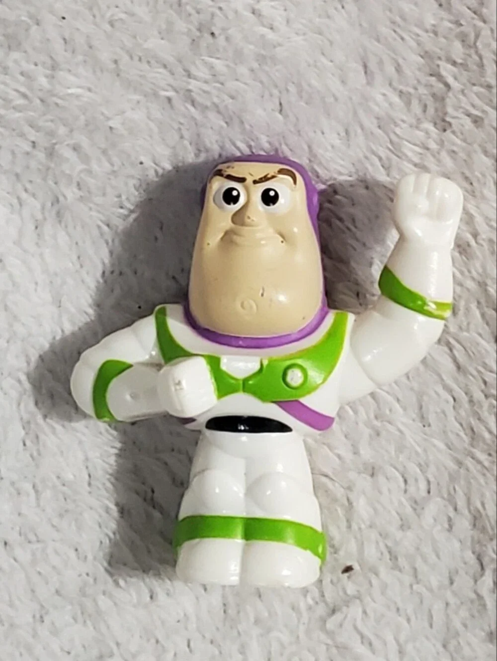 Buzz Lightyear Toy Figure in White, Green, and Purple